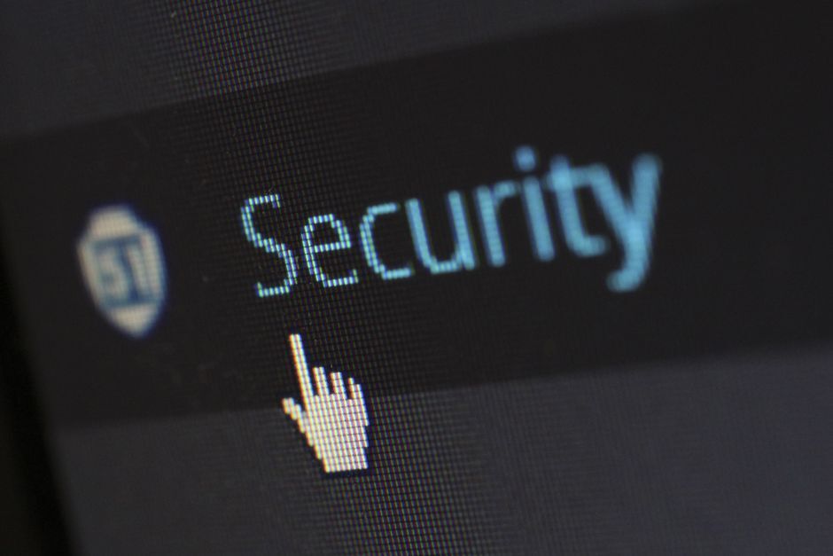 Cybersecurity shield graphic representing threat protection for freight forwarding software and trade data.