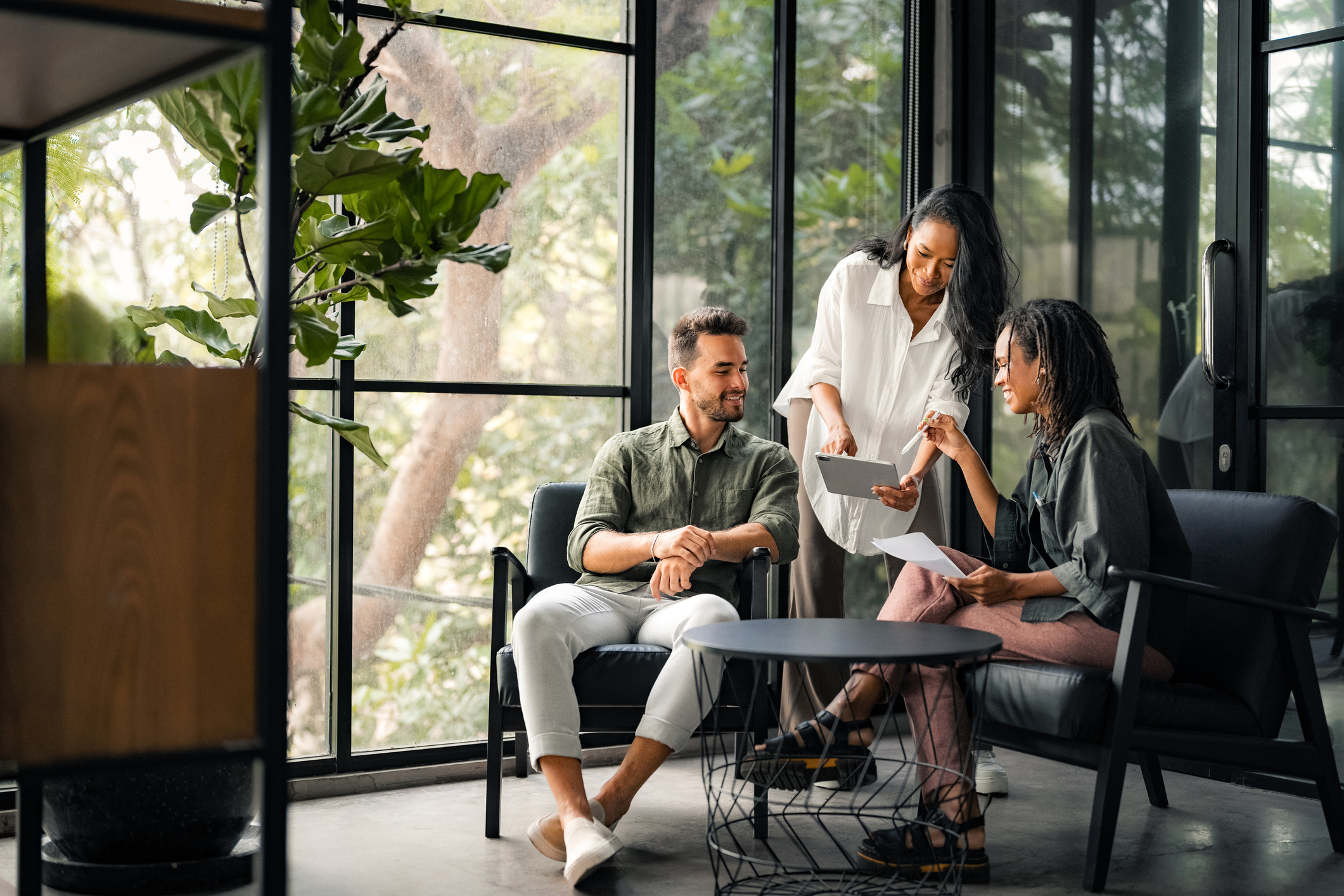 A team of professionals collaborating in a modern office setting.